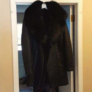 Leather sherling Pea coat with fox collar.